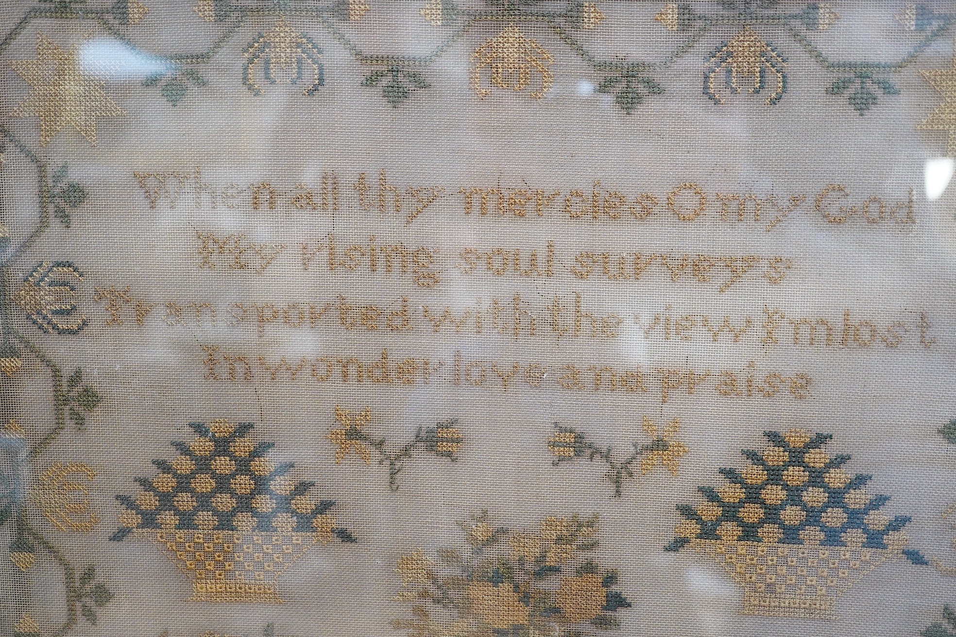 Two Victorian framed samplers; a large colourful floral sampler with short verse by Mary Burton 1862 and a smaller sampler by Julia Warner aged 13, dated 1846?, large 1862 sampler 59cm wide x 61cm high. Condition - large